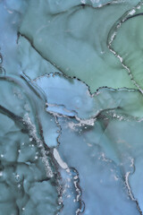 Alcohol ink art.Mixing liquid paints. Modern, abstract colorful background, wallpaper. Marble texture.Translucent colors