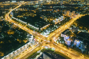 Fototapeta na wymiar aerial night view of a road intersection in a big city. Minsk, Belarus.