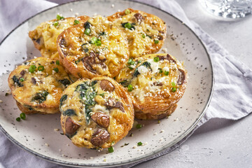 Vegetarian egg muffins with mushroom, spinach and cheese for Breakfast