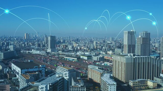 現代都市の空撮とネットワークイメージ