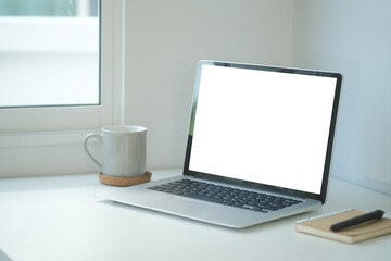 Workspace desk and laptop.Business image, Blank screen laptop and supplies.