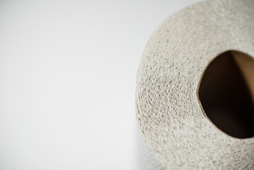 Tissue roll texture of white tissue paper background with crease,closeup detail of white toilet paper.Copy space.