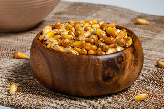 Peruvian Snacks. Fried Corn Seeds in Wooden Bowl. Peruvian food.