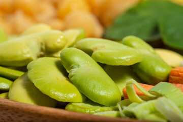 Green boiled broad beans close up. Macro photography.