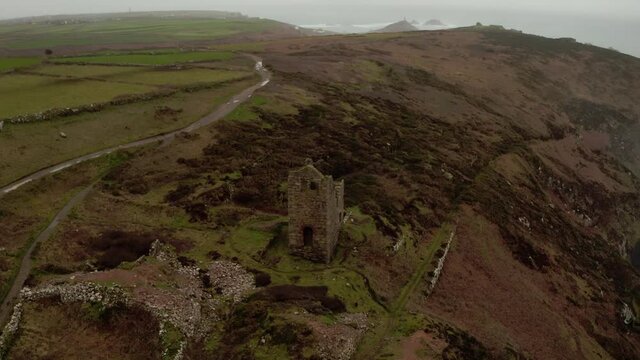 Aerial through the light mist of the ruins of the old tin mines at Cornwall.