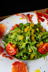 Rocket salad with dried Spanish ham