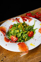 Rocket salad with dried Spanish ham