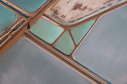 Sea water ponds of solar salt mine through sea water evaporation at Useless Loop in Western Australia