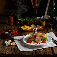 Lamb chops marinated in herbs with green asparagus and lime