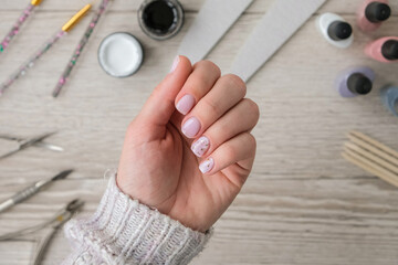Modern female nude design manicure. Nail care, Self care. Professional Hardware Manicure. Procedure...