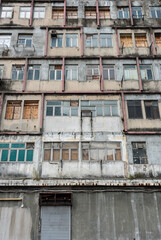 Exterior of abandoned residential building in Hong Kong city