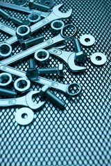 Fototapeta premium Set of chrome wrenches on steel surface. Mechanic tools for maintenance. Hardware tools to fix