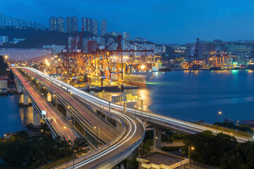 Fototapeta na wymiar Cargo port and highway in Hong Kong city