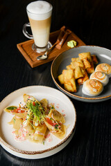 Fresh salmon and cream cheese crepes and french style sweet crepes with soft cream