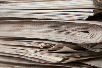 Stack of newspaper, close-up. Journalism concept