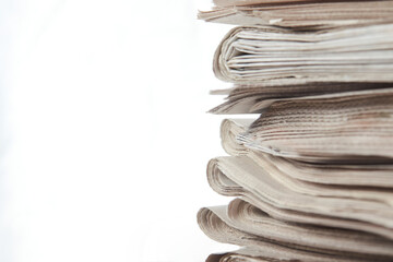Stack of newspaper, close-up. Journalism concept