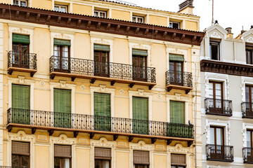Fototapeta na wymiar antique windows in buildings in the old town of Saragossa, Spain