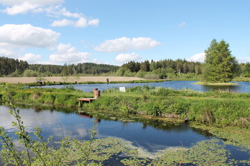 Scenic view of two fishing lakes on a bright sunny day