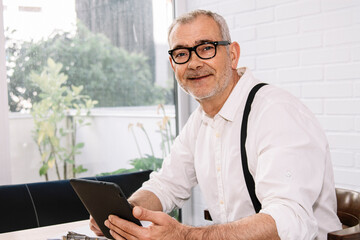 businessman with digital tablet in office