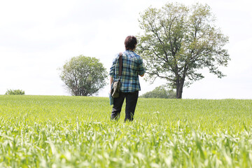 A young man looks at a map