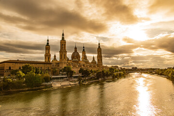  landscape from the Spanish city of Saragossa with the basilica and the Ebro river in the...