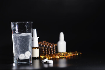 Composition from Bottles of cough syrup.Healthcare, medicine, flu and treatment concept - paper...
