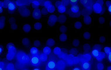 Blue bokeh background happy new year 2022. abstract effect light night out of focus circle wallpaper. for christmas party celebration holidays or technology background concept.