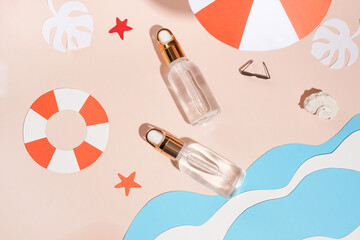 Natural essential oil, Cosmetic body care product for skin, summer beach with paper accessories