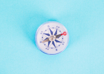 Compass on blue background