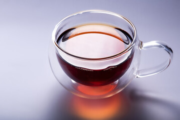 Cup of tea on gray background