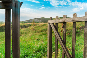Fototapeta premium Beautiful rural landscape with wooden fence