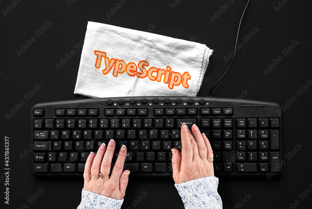 Fototapete typescript programming language. rag width word typescript and hands on pc keyboard