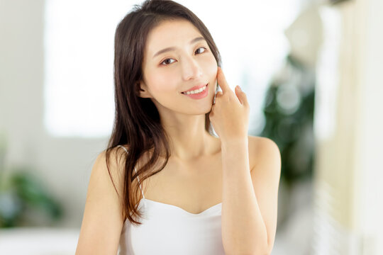 Smiling of cheerful beautiful pretty asian woman with clean fresh healthy skin