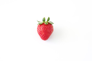 Natural and fresh single strawberry on white background, top view, copy space.
