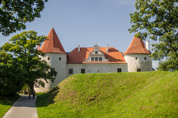 Fototapeta na wymiar Bauska city castle in Latvia up in the hill. Sunny autumn day.
