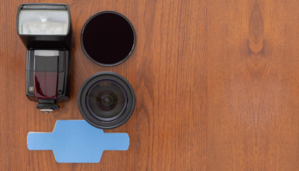 top view photo equipment ready to use on wooden table with free space on right