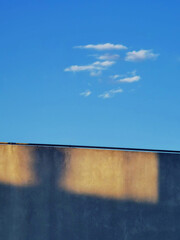 Nature and city., Sky and light reflections in a building. Minimalism and serenity