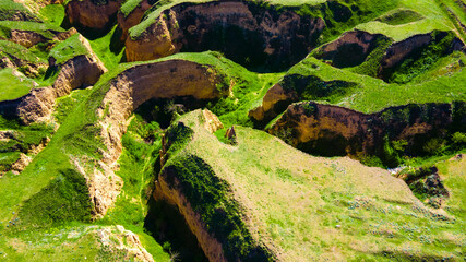 Canyon cliffs mountains green grass top view