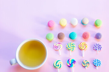 Obraz na płótnie Canvas This morning, drink honey tea with colorful snacks.