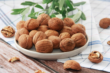 walnut fruit in a hard brown shell