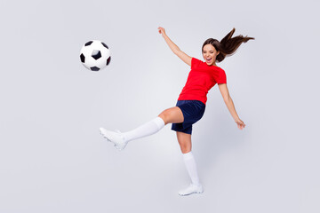 Full size profile photo of crazy lady player soccer team 2020 league final game kicking ball kickoff wear football uniform t-shirt shorts cleats socks isolated white color background