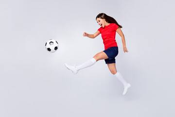 Full length profile photo of crazy air fly joy fun defender soccer team game kick ball jump run...