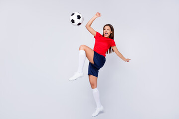 Full length photo of crazy joy fun player soccer team arena grand final game jump up passing ball shout wear spain uniform t-shirt shorts cleats knee socks isolated white color background