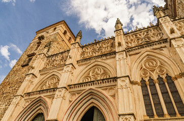 Obraz premium Main facade of the Mudejar Gothic Monastery of Guadalupe in Spain. World heritage