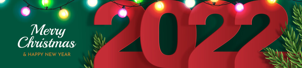 Happy New Year 2022 Design Banner.Red numbers 2022 on a green background.