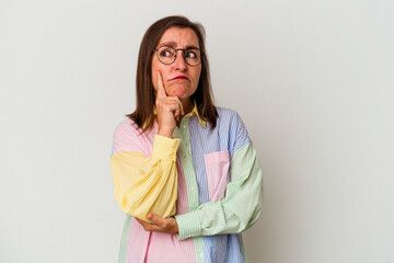 Middle age caucasian woman isolated on white background contemplating, planning a strategy, thinking about the way of a business.