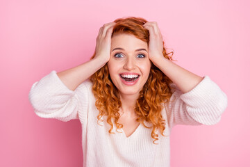 Photo portrait of curly girl amazed smiling touching head surprised isolated pastel pink color background