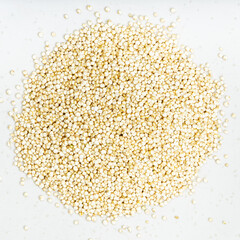 pile of quinoa grains close up on gray