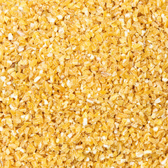 food background - crushed polished wheat grains