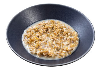 porridge from wholegrain oat in gray bowl isolated